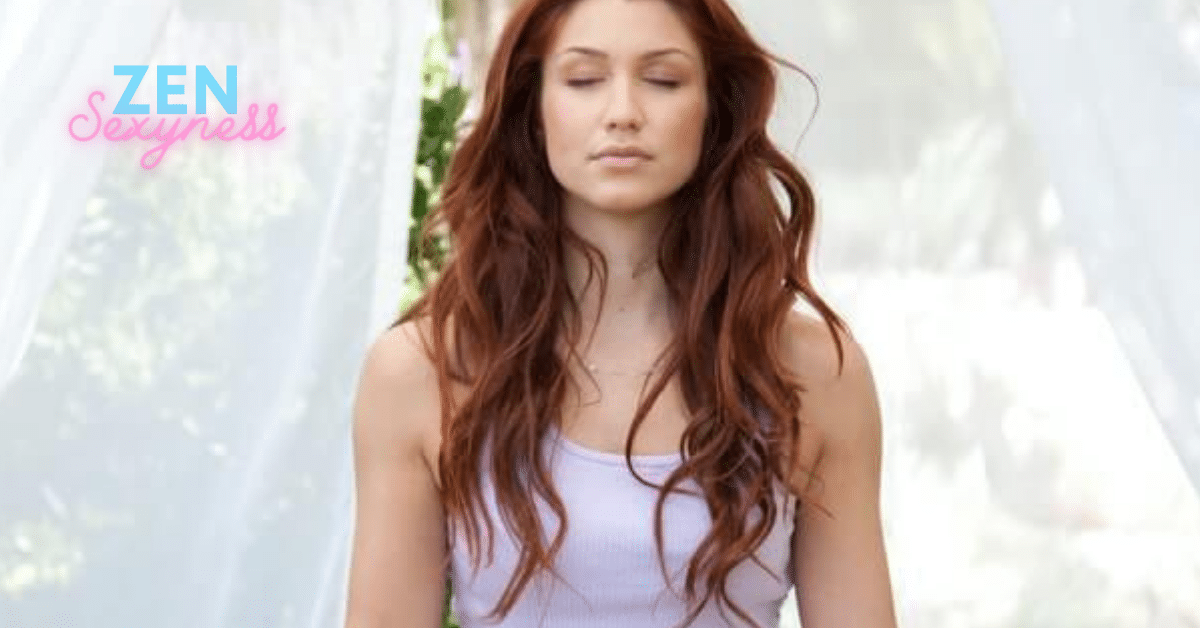 A woman meditating.