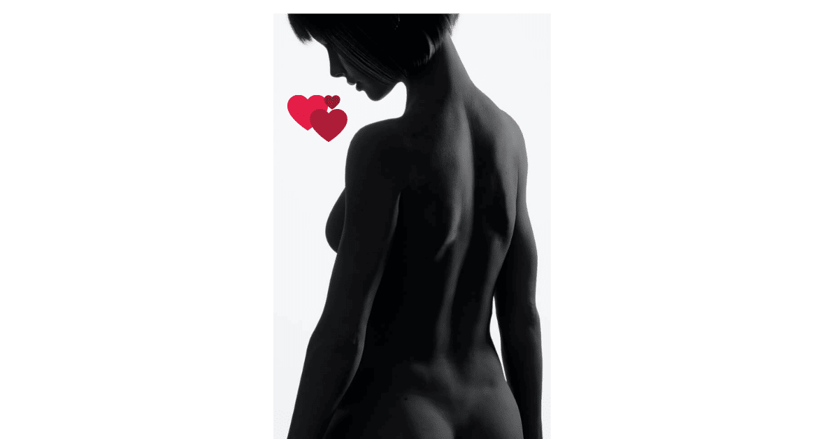 partial silhouette of a womans nude back and bum.