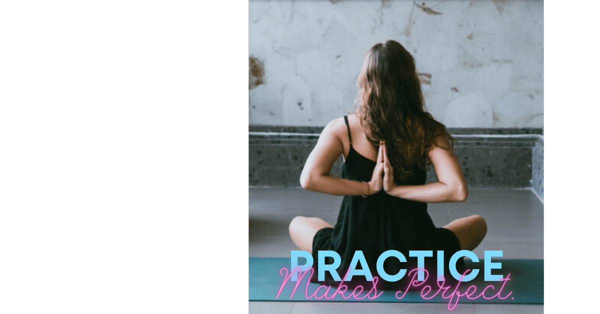 woman wearing black dress practicing the seated Reverse Prayer yoga pose.